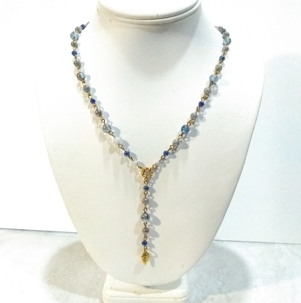 LCI stamped glass stones necklace.